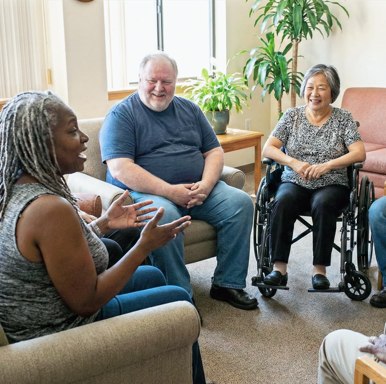 Workshop participants sharing stories in a group setting